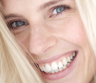 Woman smiling with straight teeth